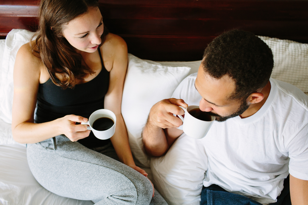 Black,And,White,Young,Couple,Drinking,Coffee,In,Bed,Together