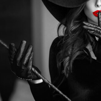 Sexy,Dominant,Woman,In,Hat,And,Whip,Showing,No,Talk